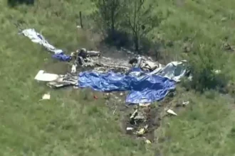 Emergency responders at the scene of a deadly skydiving plane crash in Missouri that killed 12 people.